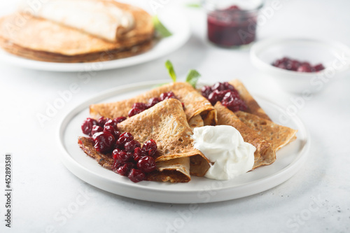 Homemade crepes with cherries