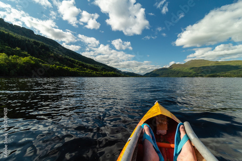 Kayaking on Loch Lomond in Scotland while on vacation © Marcin