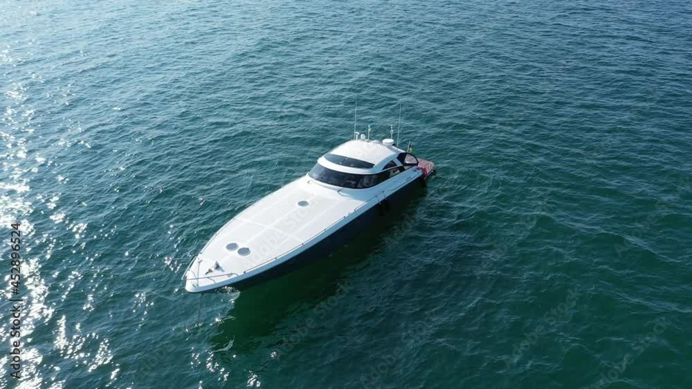 Luxury yacht among the sea. View from above. Shooting from a drone. Luxury yacht among the sea. View from above. Shooting from a drone.