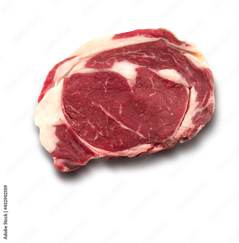 Obraz premium Chuletón crudo sobre fondo blanco. Raw ribeye on white background