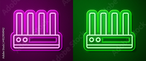 Glowing neon line Router and wi-fi signal icon isolated on purple and green background. Wireless ethernet modem router. Computer technology internet. Vector