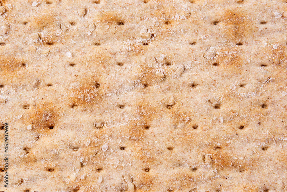 Traditional matzah bread background. Close up