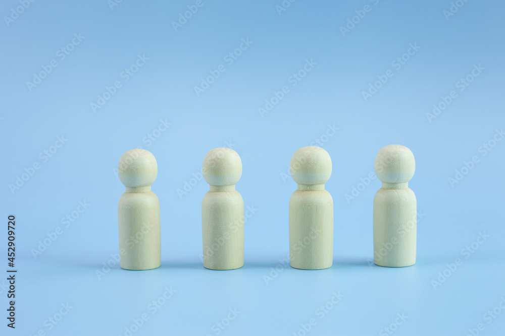 Wood person model icon on pastel blue background, copy space. Wood person model icon on pastel blue background, copy space.