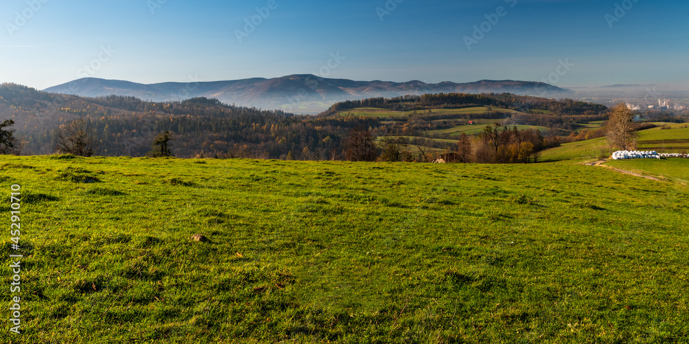View from Jelenica bellow Mala Czantoria hill above Ustron resort in Poland during autumn day with clear sky