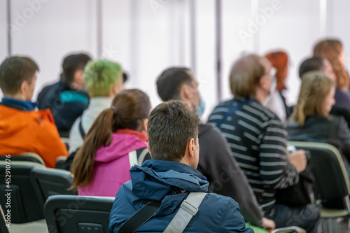 Audience listens to the lecturer at conference hall
