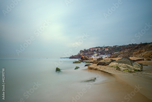 Photography Long Exposure Image of Rocks and Sand at Sunrise on the Black Sea Coast North of
