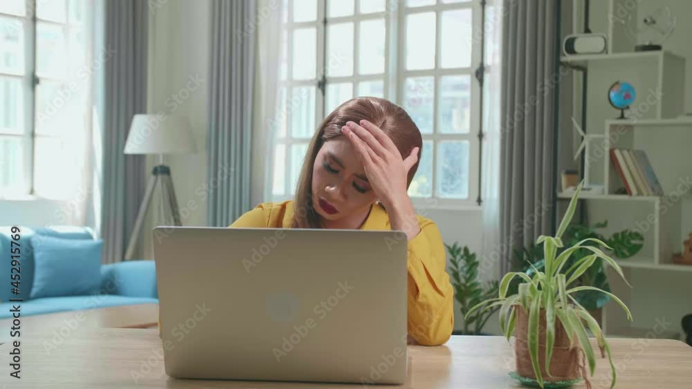 Stressed Asian Young Shemale Working With Laptop ...