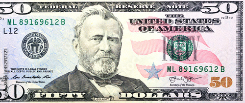 Large fragment of the Obverse side of 50 fifty dollars bill banknote series 2013 with the portrait of president Ulysses S. Grant, American money banknote, vintage retro, United States of America photo