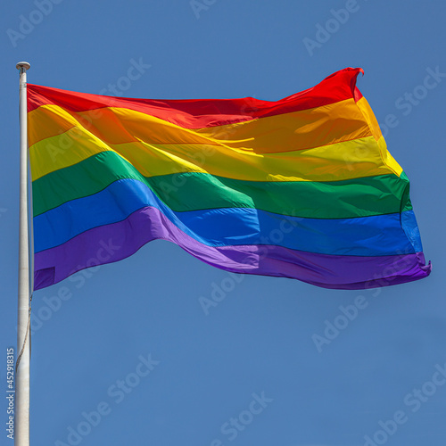 Photography rainbow flag on blue sky 01