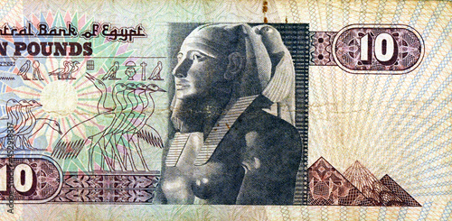 Reverse side of old 10 ten Egyptian pounds banknote currency issued 1978 to 2000 by the central bank of Egypt with Pharaoh khafra, 2570 BC 4th Dynasty, vintage retro, selective focus, large fragment