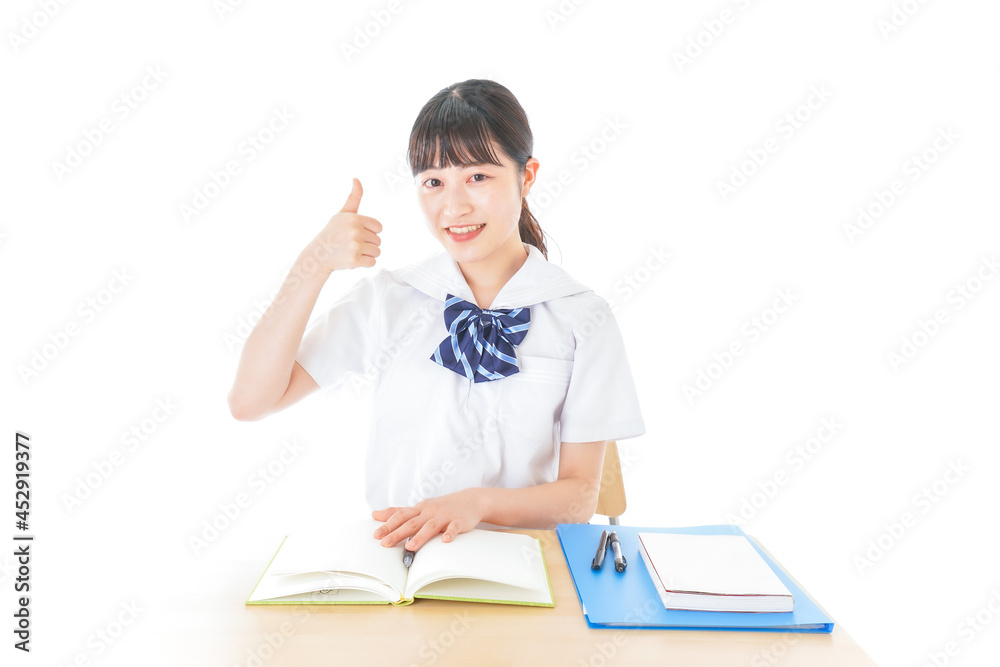 グッドサインをする笑顔の女子学生