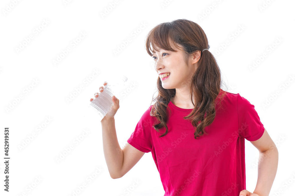 水分補給をする女性 水分補給をする女性