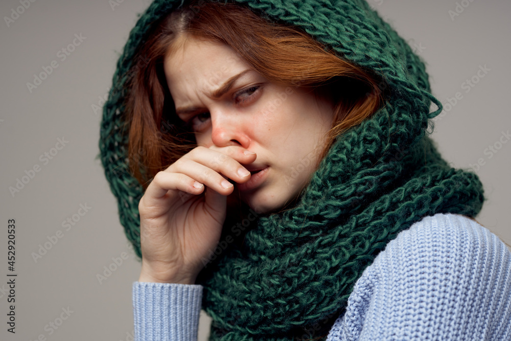 red-haired woman flu infection virus health care light background
