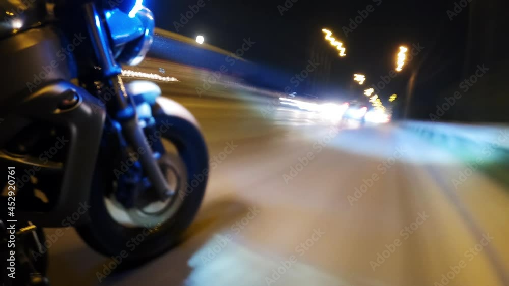 Fast Driving Bike on Streets of Night City Time Lapse. Speed Motion in Cityscape Illumination Neon. Wheel Fast Driving. Pov View Motorcyclist Drives on Motorcycle on Road in the City Hyper Lapse 4k Fast Driving Bike on Streets of Night City Time Lapse. Speed Motion in Cityscape Illumination Neon. Wheel Fast Driving. Pov View Motorcyclist Drives on Motorcycle on Road in the City Hyper Lapse 4k