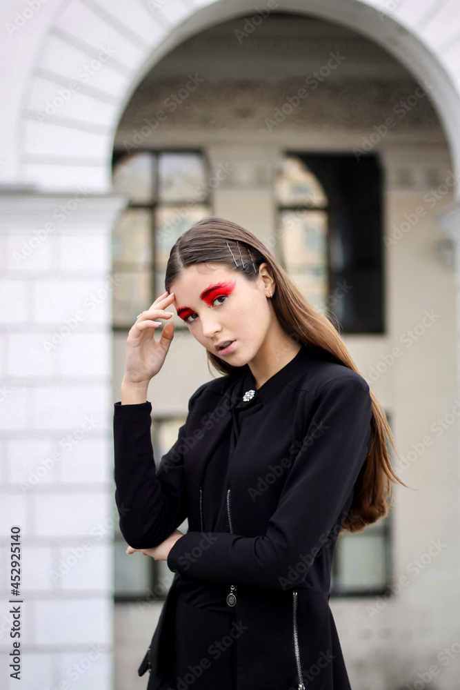 beautiful young girl model with bright red makeup. beautiful young girl model with bright red makeup.