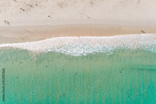 Beach top view with wave foam Amazing beach in phuket thailand ocean at sunny day summer background.