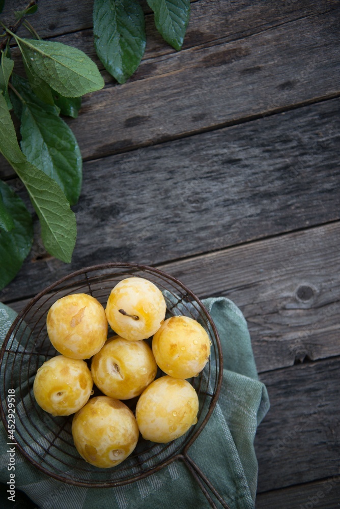 ripe apricots on a wooden table