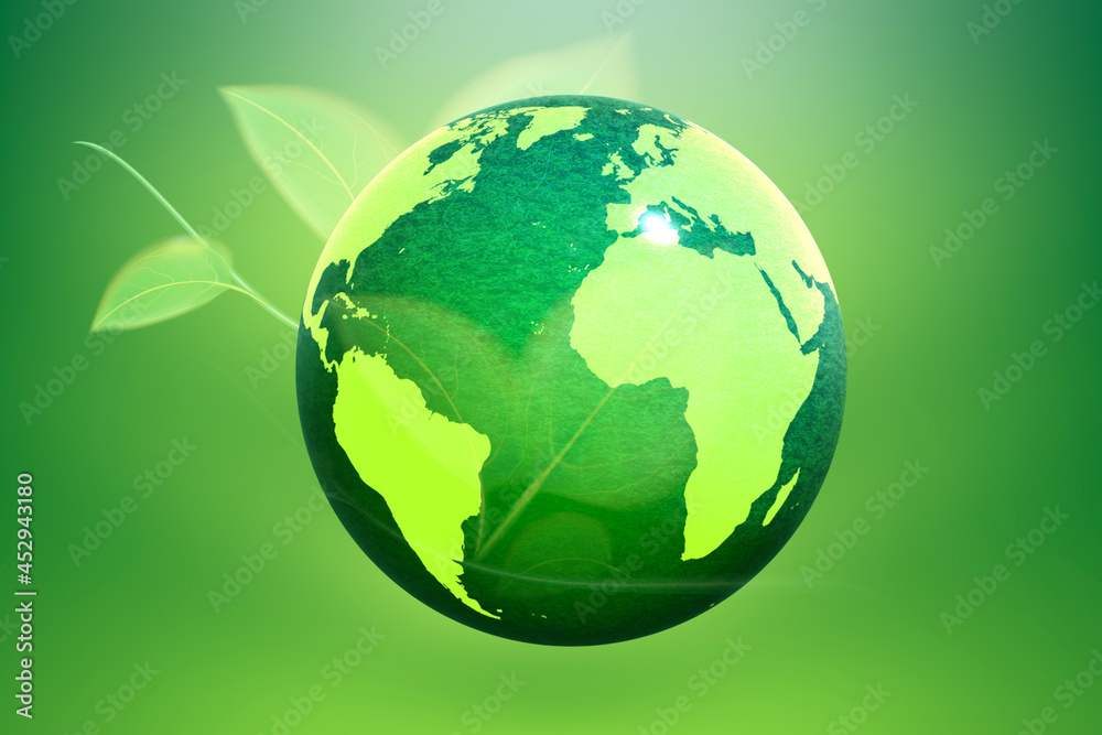 globe and leaves Green background. The concept of save the world and the environment. globe and leaves Green background. The concept of save the world and the environment.