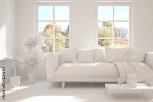 Stylish room in white color with sofa and autumn landscape in window. Scandinavian interior design. 3D illustration