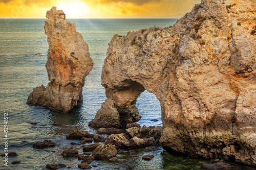 Cliffs and rocky caverns in Ponta da Piedade, Lagos - Algarve, Portugal. Beautifull cliffs at sunset in the Algarve