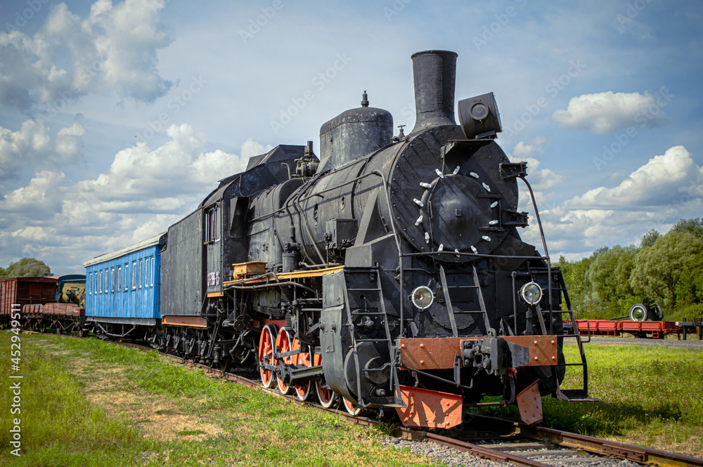 Naklejka premium old steam train. Ukrzaliznytsia. The train of the last century. Freight train