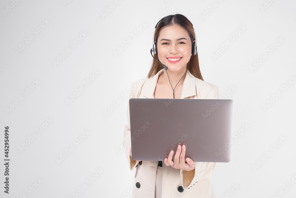 Customer service operator woman in suit wearing headset over white background studio. Customer service operator woman in suit wearing headset over white background studio.