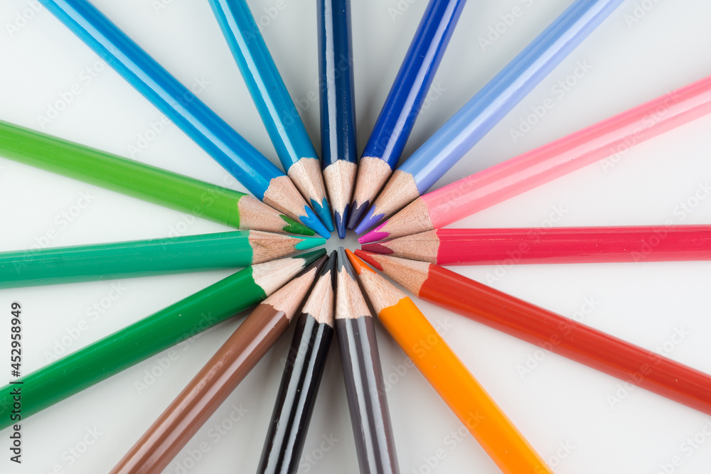 set of colored pencils lined by an arc set of colored pencils lined by an arc