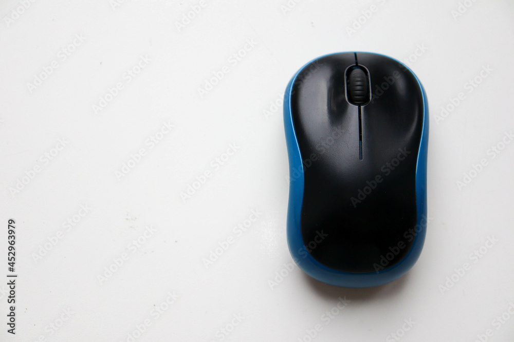 wireless computer mouse on white table background wireless computer mouse on white table background