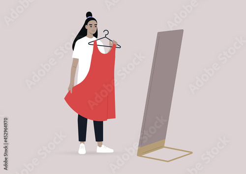 A young female Asian character trying a dress in a fitting room, fashion industry and modern feminism