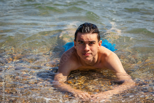 Teen boy on the foreshore