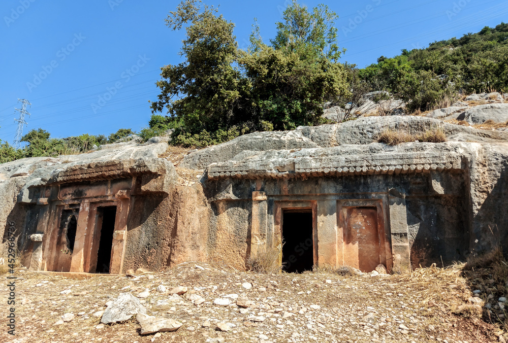 The ancient Rock-cut tombs in Myra, town in Lycia, which became the small Turkish town of Kale, renamed Demre. Turkey The ancient Rock-cut tombs in Myra, town in Lycia, which became the small Turkish town of Kale, renamed Demre. Turkey