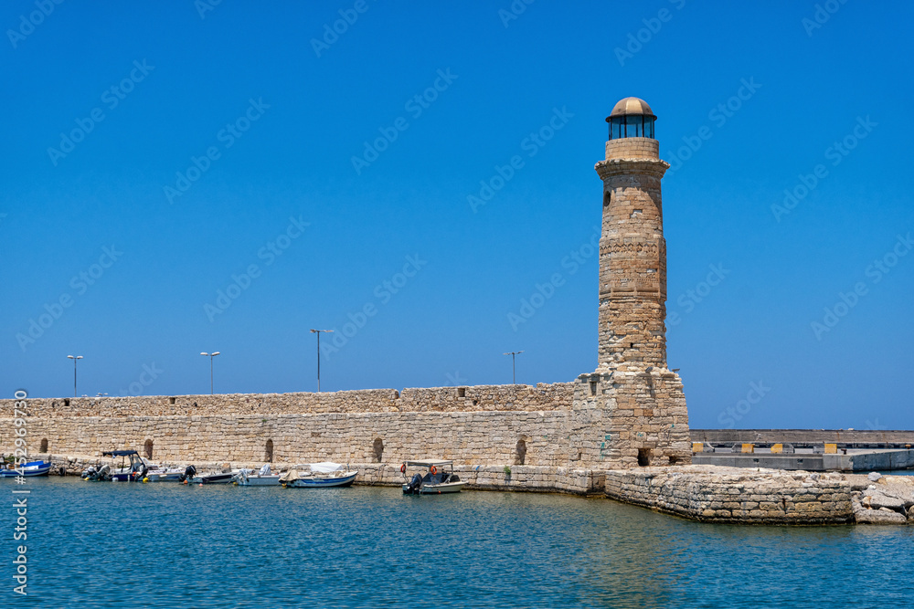 The historic lighthouse in the port of Rethymno on the Greek island of Crete