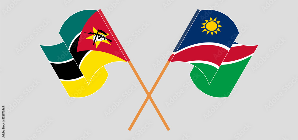 Crossed and waving flags of Mozambique and Namibia Crossed and waving flags of Mozambique and Namibia