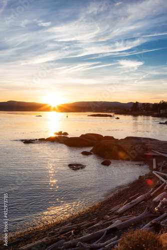 Scenic View of the Coastline on the West Pacific Ocean Coast. Summer Sunset. MacAulay Point Park in Victoria, Vancouver Island, British Columbia, Canada.
