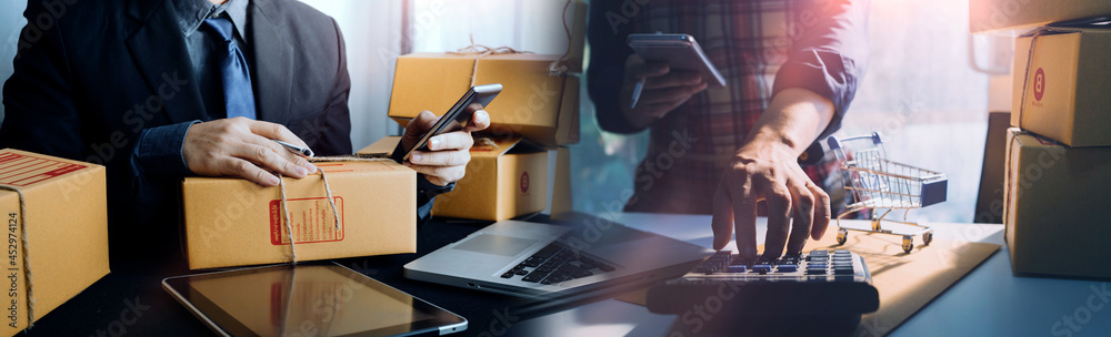 Business woman start up small business entrepreneur SME success .freelance woman working at home with Online Parcel delivery. SME and packaging deliveryconcept - obrazy, fototapety, plakaty 
