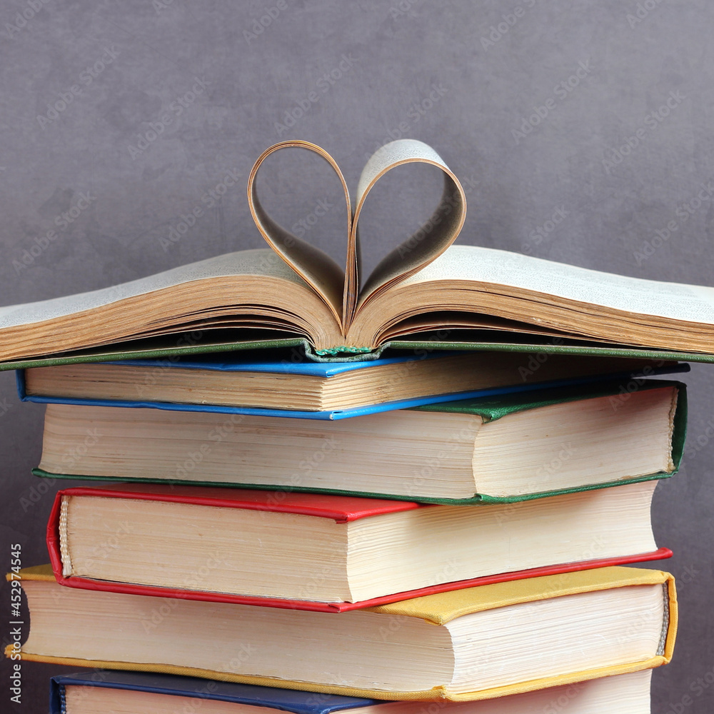 stack of thick hardcover books heart shaped pages stack of thick hardcover books heart shaped pages