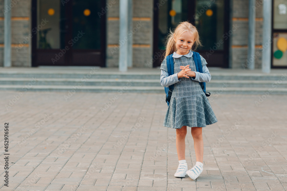 Cute little girl with backpack going back to school. Cute little girl with backpack going back to school.