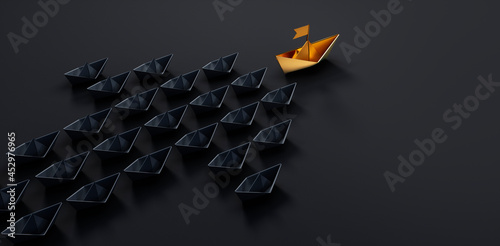 Fototapeta Group of black paper boats with golden leader on dark background