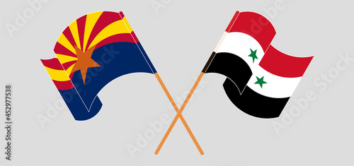 Crossed and waving flags of the State of Arizona and Syria