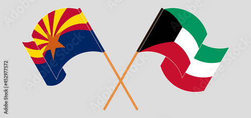 Crossed and waving flags of the State of Arizona and Kuwait