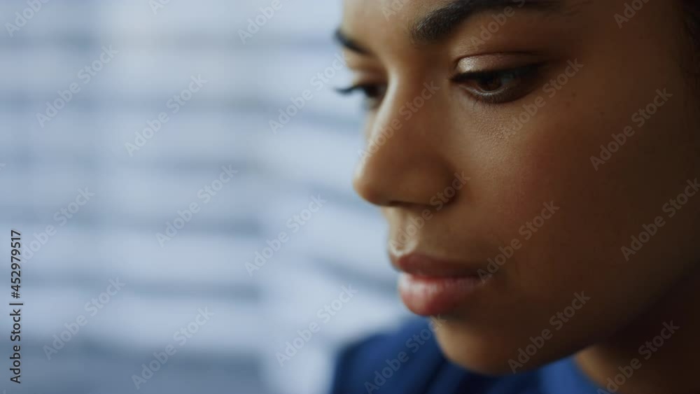 Thoughtful business woman face closeup. Serious professional thinking problem