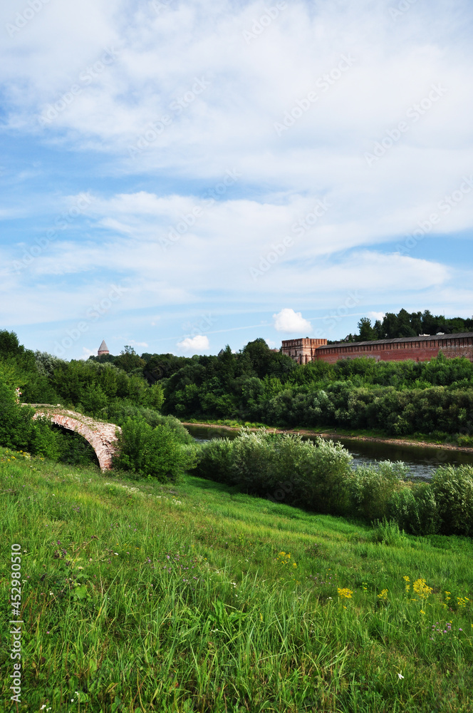 Panoramic view of the river and the fortress wall. Dnieper and red brick wall.