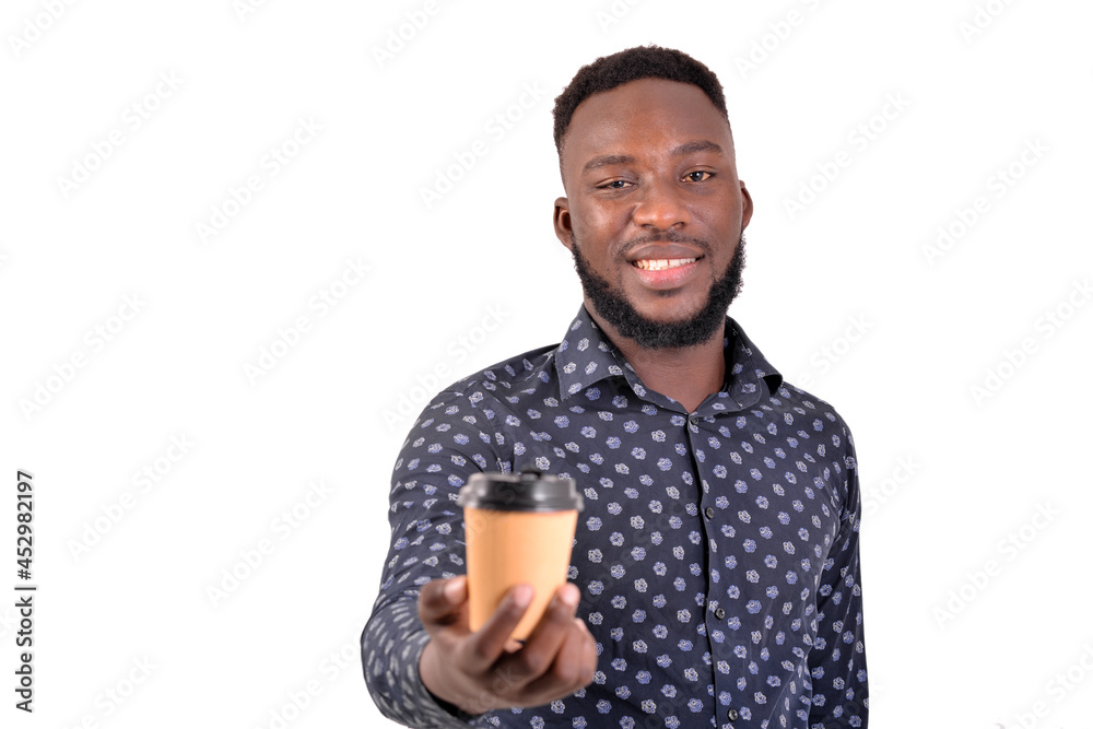 young businessman giving a cup of coffee smiling. young businessman giving a cup of coffee smiling.
