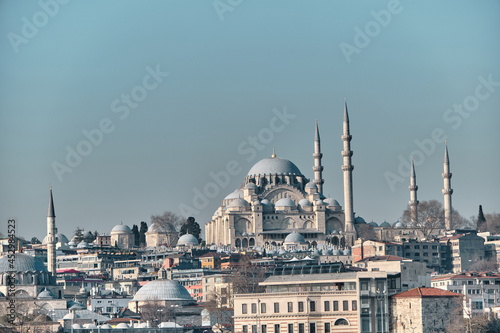 Turkey istanbul 03.03.2021. Istanbul eminonu square and port with suleymaniye mosque and internal transportation ferry in istanbul bosporus and galata bridge