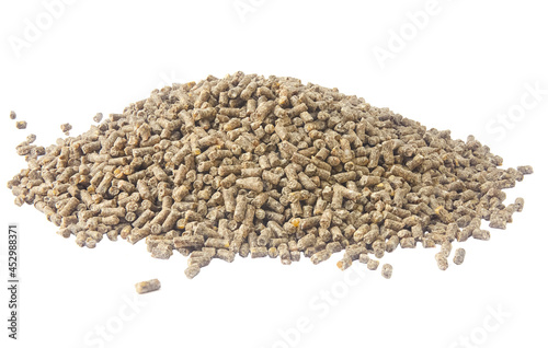 Slide granulated chicken feed isolated on white background