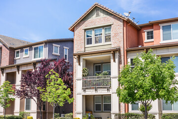 Exterior view of modern apartment building offering luxury rental units in Silicon Valley; Sunnyvale, San Francisco bay area, California