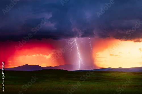 lightning bolt storm at sunset