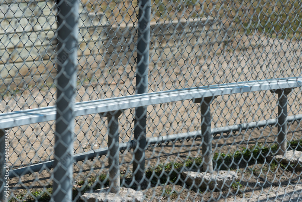 chain link fence at a baseball field chain link fence at a baseball field