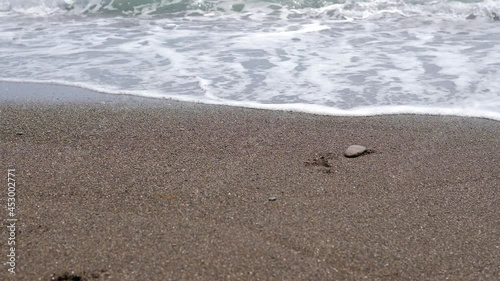 The seashore. The waves beat close the shore photo