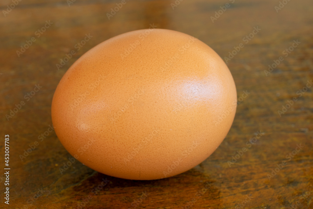 free range egg isolated on a rustic table